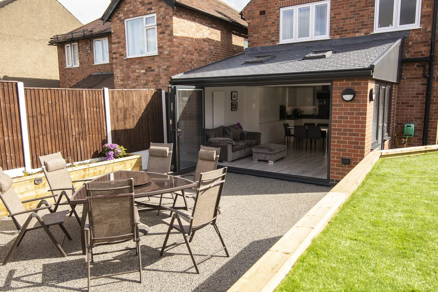 Rear extension opening onto a garden